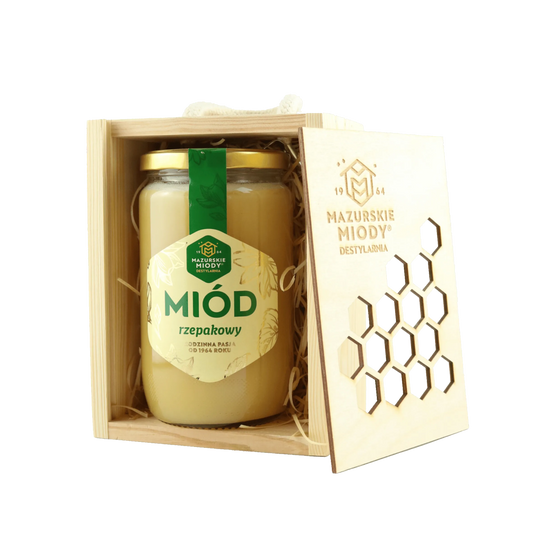 Miód rzepakowy w drewnianej skrzynce